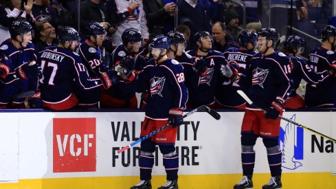  Columbus Blue Jackets right wing Oliver Bjorkstrand (28) celebrates with teammates after scoring a goal against the Philadelphia Flyers in the first period at Nationwide Arena.