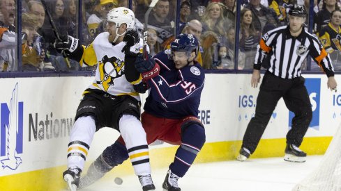 Columbus Blue Jackets center Matt Duchene fights for position against Pittsburgh Penguins defenseman Brian Dumoulin during a game at Nationwide Arena.