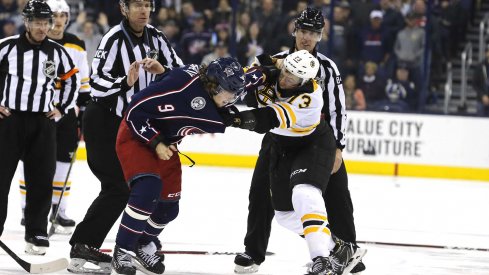 Artemi Panarin fights Charlie McAvoy 