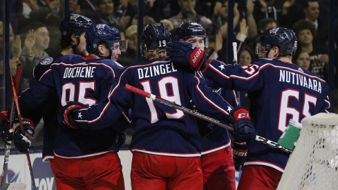 Matt Duchene, Ryan Dzingel, and Josh Anderson celebrate a goal against the Blue Jackets against the Boston Bruins