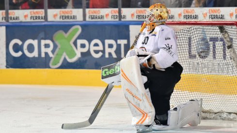 Elvis Merzlikins looks on in a game for Lugano HC of the NLA