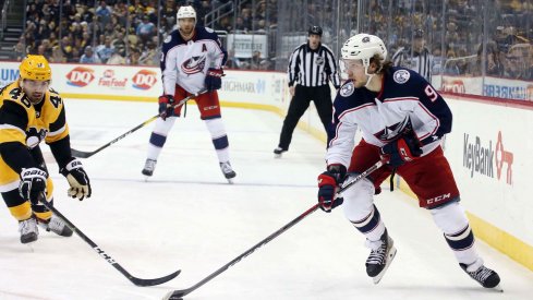 Columbus Blue Jackets left wing Artemi Panarin (9) skates with the puck against Pittsburgh Penguins center Zach Aston-Reese (46) during the third period at PPG PAINTS Arena. The Penguins shut out the Blue Jackets 3-0.