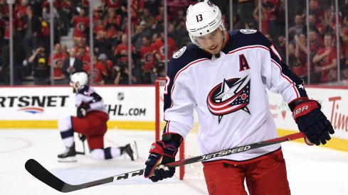 Columbus Blue Jackets right wing Cam Atkinson (13) reacts to a Calgary Flames empty net goal in the third period at Scotiabank Saddledome. Flames won 4-2. 