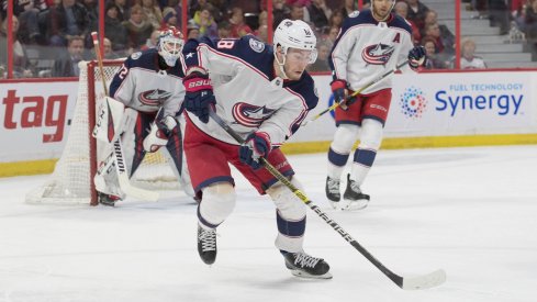 Pierre-Luc Dubois skates with the puck against the Ottawa Senators at the Canadian Tire Centre