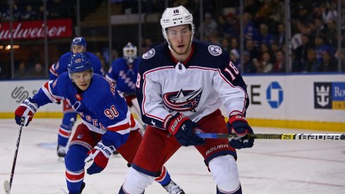 Pierre-Luc Dubois fights for a puck against the New York Rangers