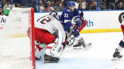 Columbus Blue Jackets goaltender Sergei Bobrovsky watches as Tampa Bay Lightning forward Brayden Point controls the puck at Amalie Arena.