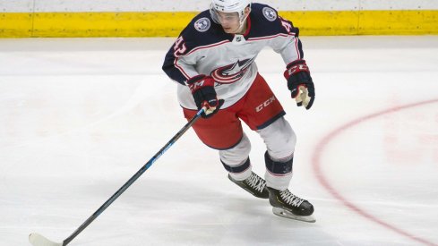 Columbus Blue Jackets center Alexandre Texier (42) skates with the puck in the third period against the Ottawa Senators at the Canadian Tire Centre.