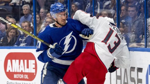 Columbus Blue Jackets forward Cam Atkinson collides with Tampa Bay Lightning defenseman Ryan McDonagh during a game at Amalie Arena in Tampa, Florida.