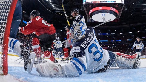 Columbus Blue Jackets prospect Veini Vehvilainen scrambles for position during a game for Team Finland.