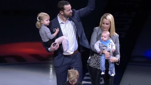 Former Columbus Blue Jackets captain Rick Nash and his wife Jessica salute the crowd at Nationwide Arena.