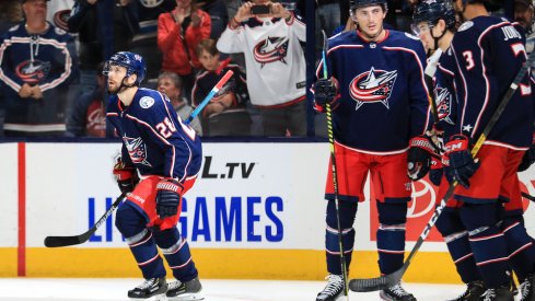 Columbus Blue Jackets right wing Oliver Bjorkstrand (28) celebrates with teammates after scoring a goal against the Buffalo Sabres in the first period at Nationwide Arena. 