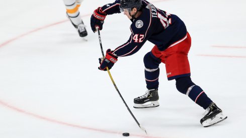 Columbus Blue Jackets center Alexandre Texier (42) shoots and scores the game winning goal against the Buffalo Sabres in the overtime period at Nationwide Arena.