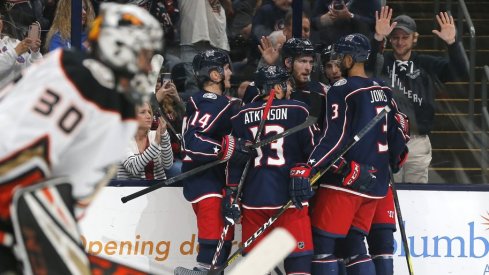 Dubois and Company Celebrate the Centre's First Goal of the Season