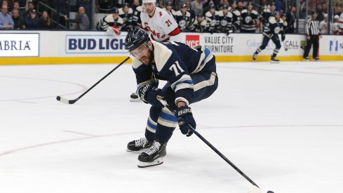  Nick Foligno fights for a puck