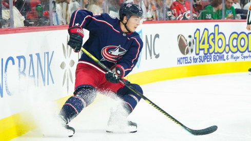 Oct 12, 2019; Raleigh, NC, USA; Columbus Blue Jackets defenseman Zach Werenski (8) stops with the puck against the Carolina Hurricanes at PNC Arena. The Columbus Blue Jackets defeated the Carolina Hurricanes 3-2. Mandatory Credit: James Guillory-USA TODAY Sports