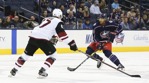 Oct 23, 2018; Columbus, OH, USA; Columbus Blue Jackets defenseman Seth Jones (3) carries the puck as Arizona Coyotes left wing Lawson Crouse (67) defends during the first period at Nationwide Arena.