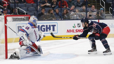 Dec 5, 2019; Columbus, OH, USA; New York Rangers goalie Alexandar Georgiev (40) makes a save against Columbus Blue Jackets center Emil Bemstrom (52) during the first period at Nationwide Arena.