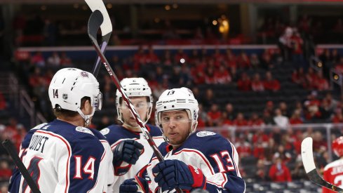 Dec 9, 2019; Washington, DC, USA; Columbus Blue Jackets right wing Cam Atkinson (13) celebrates with teammates after scoring a goal against the Washington Capitals in the first period at Capital One Arena. Mandatory Credit: Geoff Burke-USA TODAY Sports