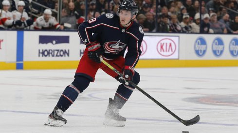 Dec 31, 2019; Columbus, Ohio, USA; Columbus Blue Jackets defenseman Zach Werenski (8) looks to pass against the Florida Panthers during the second period at Nationwide Arena. Mandatory Credit: Russell LaBounty-USA TODAY Sports