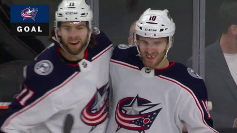 Stenlund and Wennberg celebrate a goal