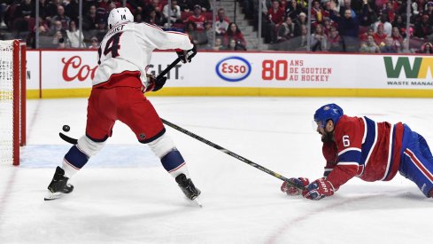 Feb 2, 2020; Montreal, Quebec, CAN; Columbus Blue Jackets forward Gustav Nyquist (14) scores a goal and Montreal Canadiens defenseman Shea Weber (6) defends during the third period at the Bell Centre.