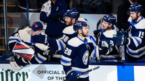 Columbus Blue Jackets right wing Oliver Bjorkstrand (28) celebrates with teammates on the bench after scoring a goal against the Tampa Bay Lightning in the second period at Nationwide Arena