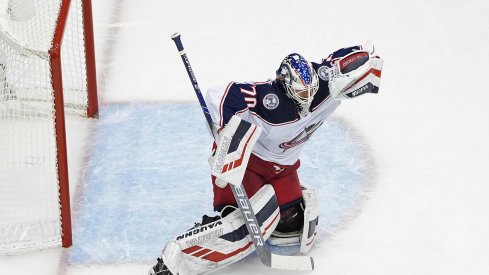 Joonas Korpisalo #70 of the Columbus Blue Jackets stops a shot against the Toronto Maple Leafs during the first period in Game Two of the Eastern Conference Qualification Round prior to the 2020 NHL Stanley Cup Playoff at Scotiabank Arena on August 04, 2020 in Toronto, Ontario, Canada. 