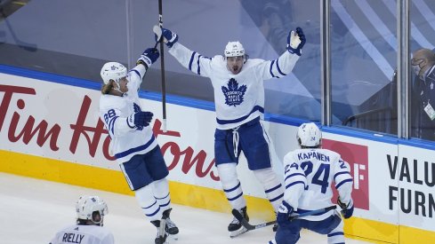 Auston Matthews celebrates after scoring the overtime game-winner in Game 4