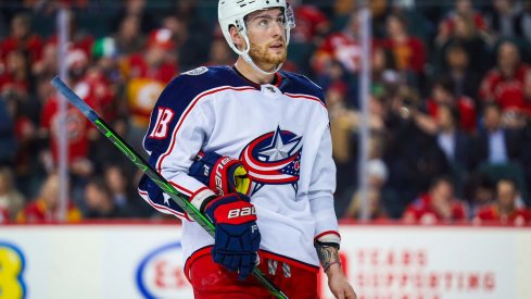 Pierre-Luc Dubois looks to the scoreboard against the Calgary Flames