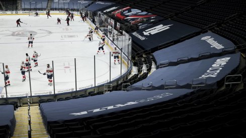 Jan 28, 2021; Columbus, Ohio, USA; The Florida Panthers and the Columbus Blue Jackets skate during warmups prior to the game at Nationwide Arena.