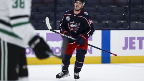 Feb 4, 2021; Columbus, Ohio, USA; Columbus Blue Jackets center Jack Roslovic (96) celebrates after scoring a goal against the Dallas Stars in the first period at Nationwide Arena.