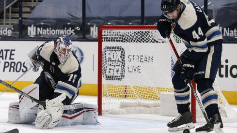 Vladislav Gavrikov attempts to play a rebound against the Carolina Hurricanes