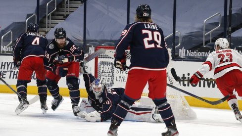  Columbus Blue Jackets goalie Joonas Korpisalo (70) makes a save against the Carolina Hurricanes during the second period at Nationwide Arena. 