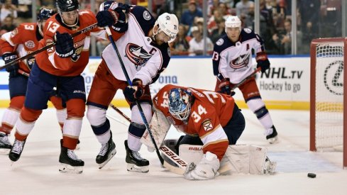 Columbus Blue Jackets left wing Nick Foligno (71) takes a shot on Florida Panthers goaltender James Reimer (34) during the first period at BB&T Center.