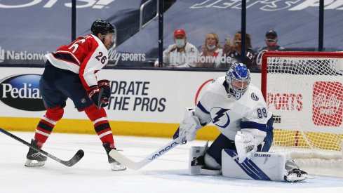 Apr 6, 2021; Columbus, Ohio, USA; Columbus Blue Jackets center Zac Dalpe (26) beats Tampa Bay Lightning goalie Andrei Vasilevskiy (88) on a backhander for a goal during the first period at Nationwide Arena.