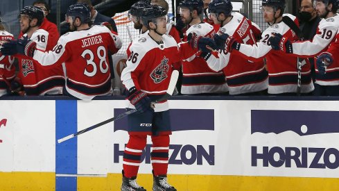 Jack Roslovic celebrates a goal against the Tampa Bay Lightning