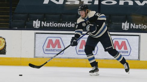 Columbus Blue Jackets right wing Patrik Laine (29) passes the puck against the Carolina Hurricanes during the first period at Nationwide Arena