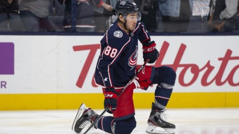 Columbus Blue Jackets right wing Kole Sherwood (88) stretches in warm-ups prior to a game against the Calgary Flames at Nationwide Arena.