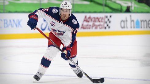 Columbus Blue Jackets defenseman Michael Del Zotto (15) passes the puck during the first period against the Dallas Stars at the American Airlines Center. 