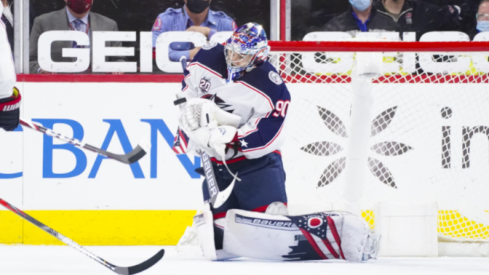 Elvis Merzlikins makes a save during second period action in the Columbus Blue Jackets overtime loss to Carolina.