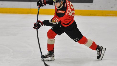 Yegor Chinakhov shoots the puck.