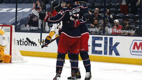 May 3, 2021; Columbus, Ohio, USA; Columbus Blue Jackets center Emil Bemstrom (52) celebrates a goal against the Nashville Predators during the third period at Nationwide Arena.