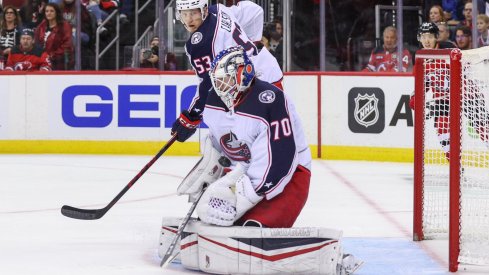 Oct 31, 2021; Newark, New Jersey, USA; Columbus Blue Jackets goaltender Joonas Korpisalo (70) makes a save against the New Jersey Devils during the second period at Prudential Center.