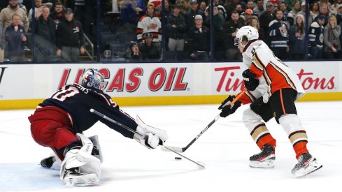 Columbus Blue Jackets' Elvis Merzlikins is beat in the shootout versus Rickard Rakell of the Anaheim Ducks at Nationwide Arena.