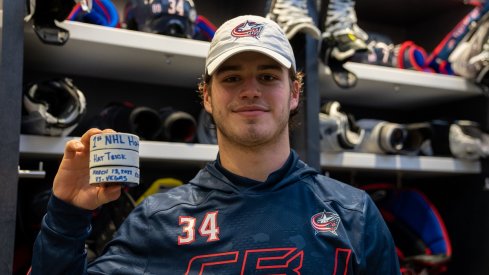 Cole Sillinger celebrates his first career hat trick