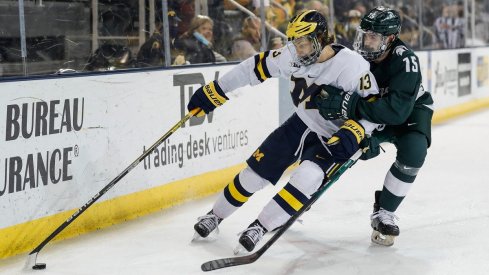 Kent Johnson skates against Michigan State University 