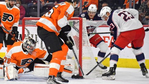 Apr 5, 2022; Philadelphia, Pennsylvania, USA; Columbus Blue Jackets center Brendan Gaunce (23) scores a goal against Philadelphia Flyers goaltender Carter Hart (79) during the first period at Wells Fargo Center. 