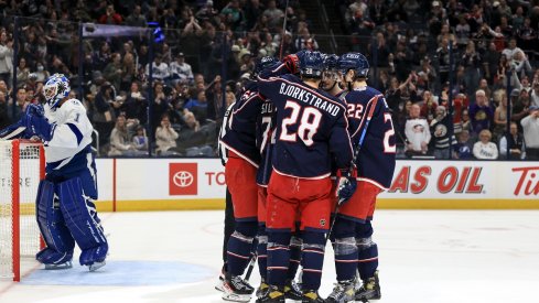 The Blue Jackets celebrate a goal against the Tampa Bay Lightning at Nationwide Arena