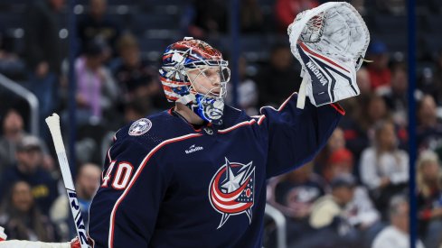 Columbus Blue Jackets goaltender Daniil Tarasov (40) gestures to teammates during a stop in play against the Buffalo Sabres in the first period at Nationwide Arena.