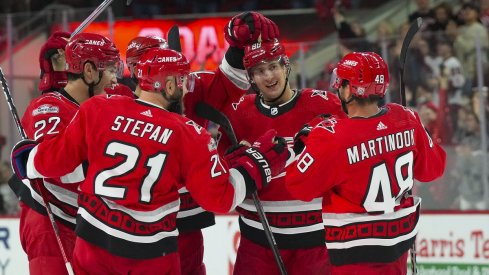 The Carolina Hurricanes celebrate a goal against the Blue Jackets 